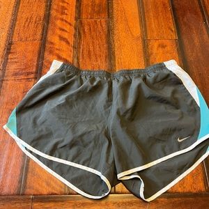 Gray, blue and white Nike running shorts